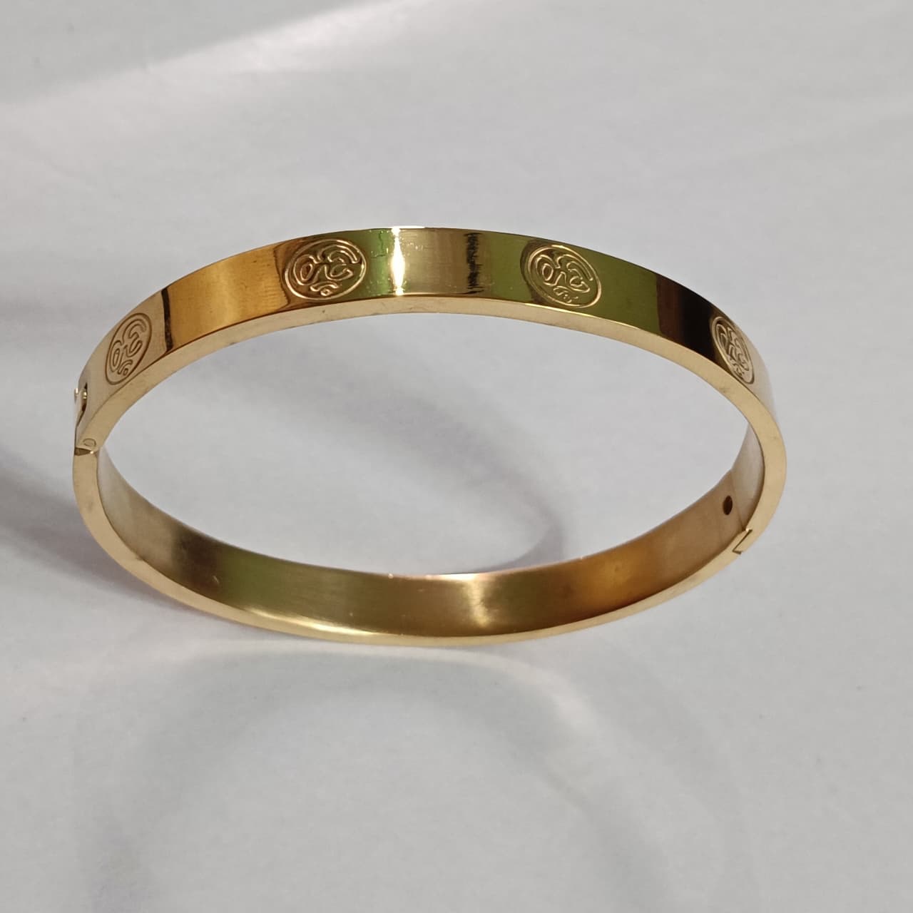 Om Symbol Gold-Toned Bracelet - Image 1